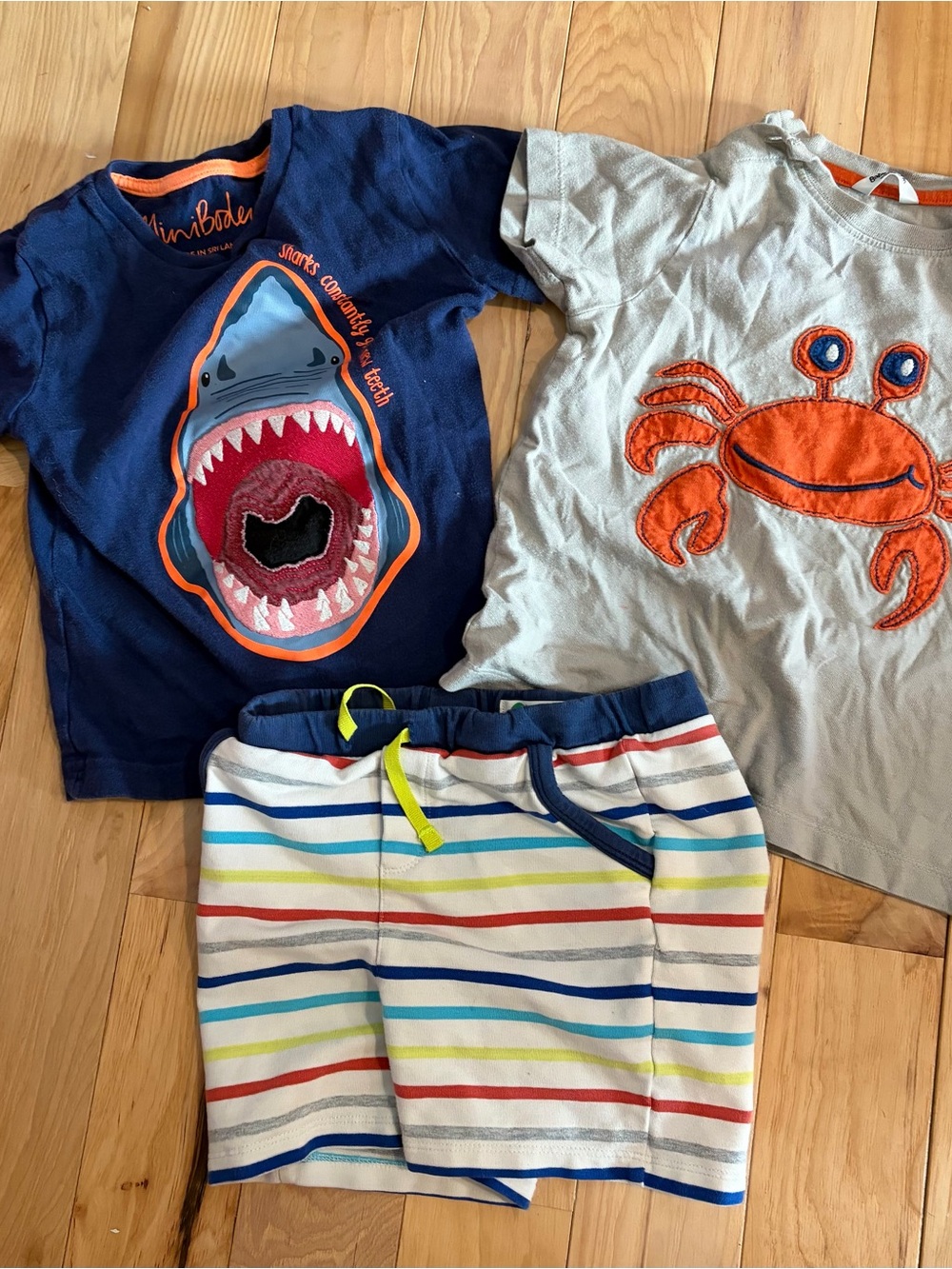 Mini Boden Multicolor Striped Shorts with Navy Waistband and two appliqué shirts